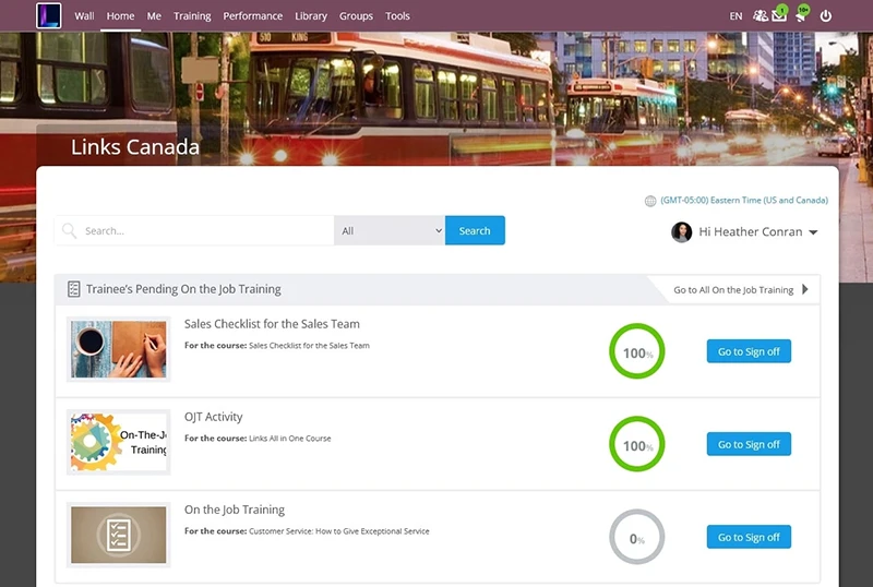 Training dashboard showing pending tasks with progress indicators and a background image of a city.