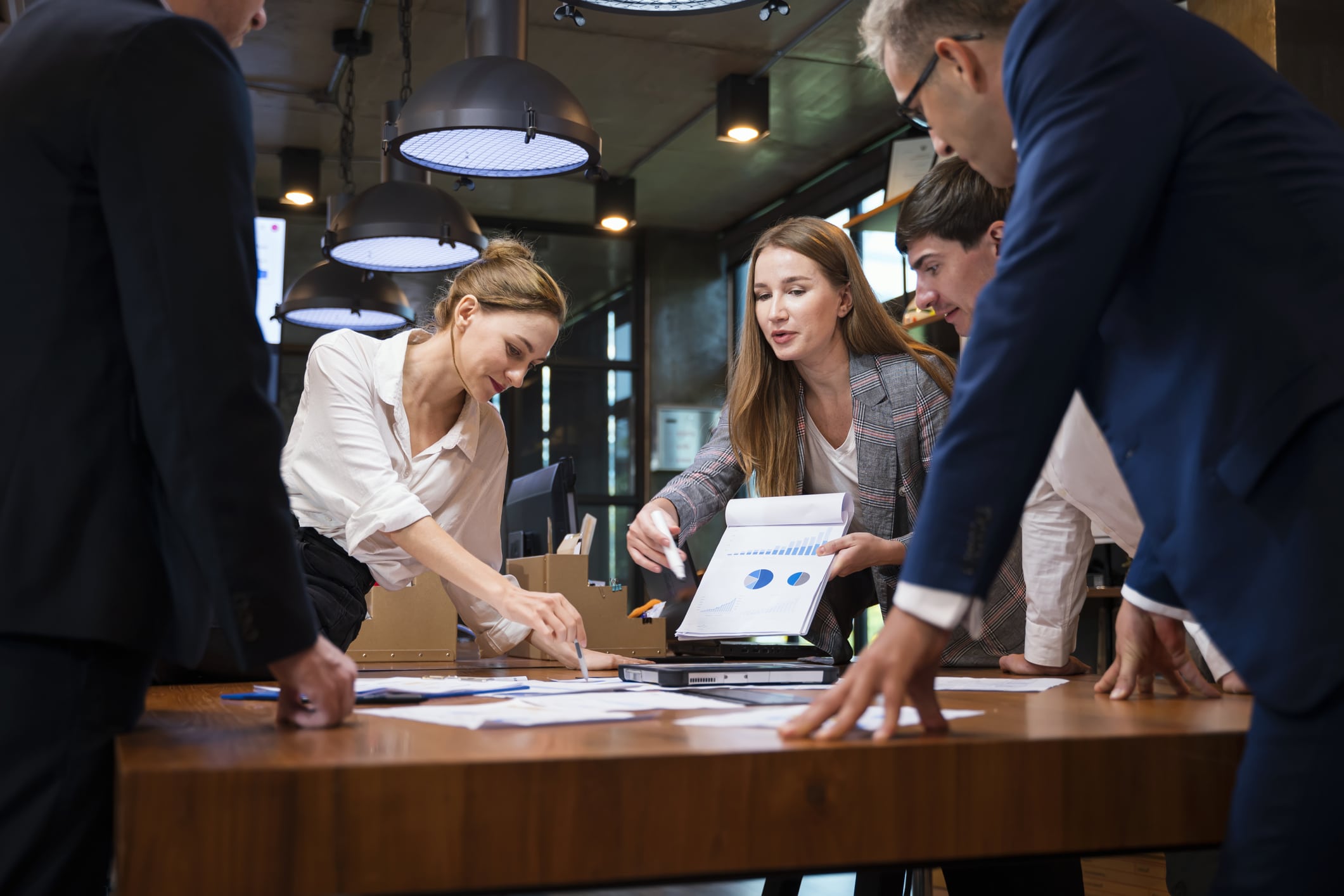 Promoting Women's Empowerment as a Business Strategy Toward Sustainable. A Female Business Development Leader having a project status meeting or decision to report, analyze and improve to increases team's overall productivity in a tech business office.