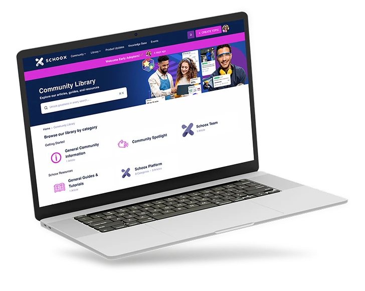 A laptop displaying the Schook Community Library page with various resources and categories.