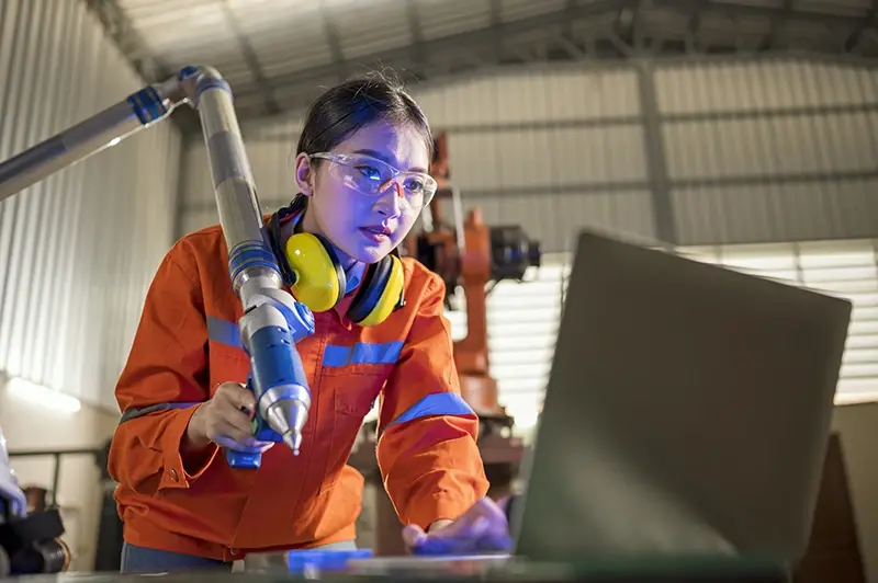 An engineer working on a large-scale project as a result of effective frontline professional development.